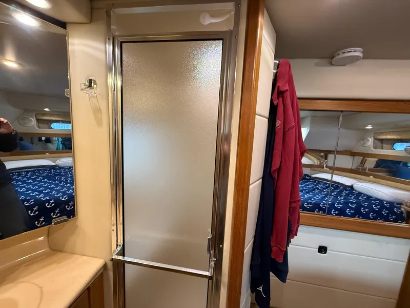 Slide: The Image of 2002 Bayliner 4087 Aft Cabin Motoryacht interior with shower and cozy bedroom. - 21