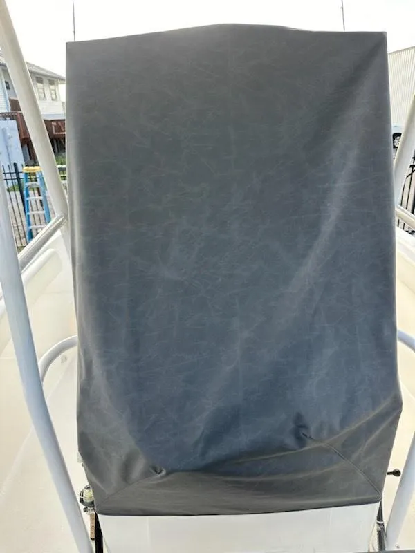 Slide: The Image of 2015 Striper 200 Center Console boat with a covered console. - 17