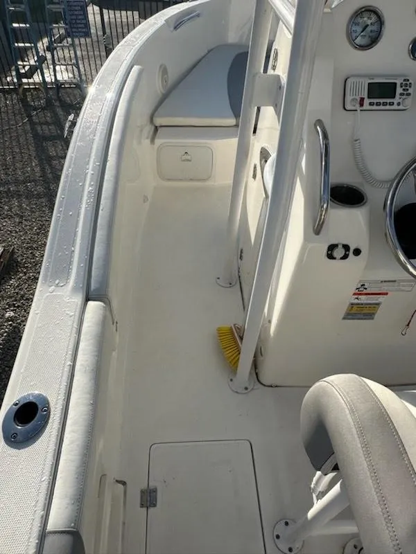 Slide: The Image of 2015 Striper 200 Center Console boat interior with seating and control panel. - 3