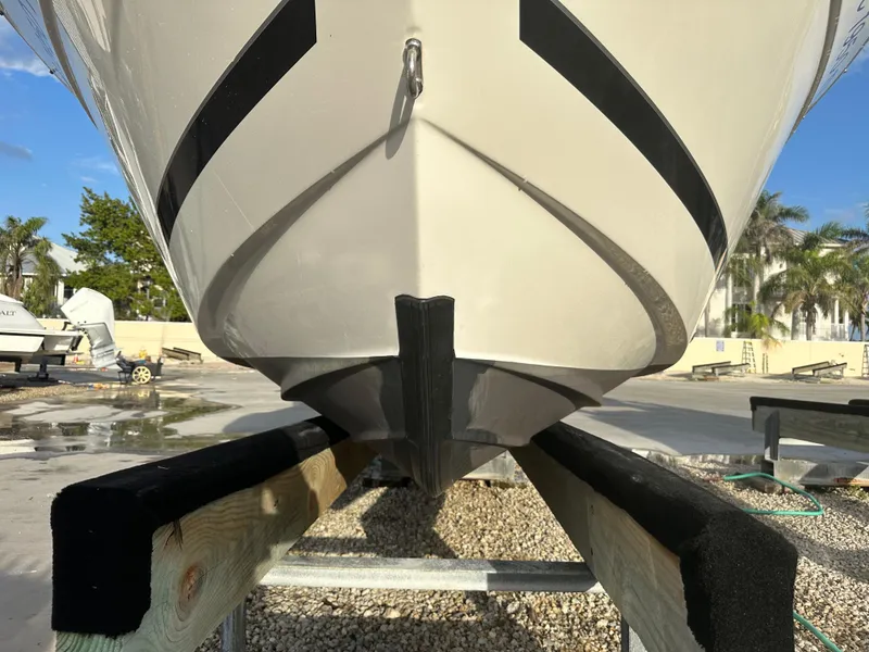 Slide: The Image of 2015 Striper 200 Center Console boat on trailer, close-up of hull and keel. - 4