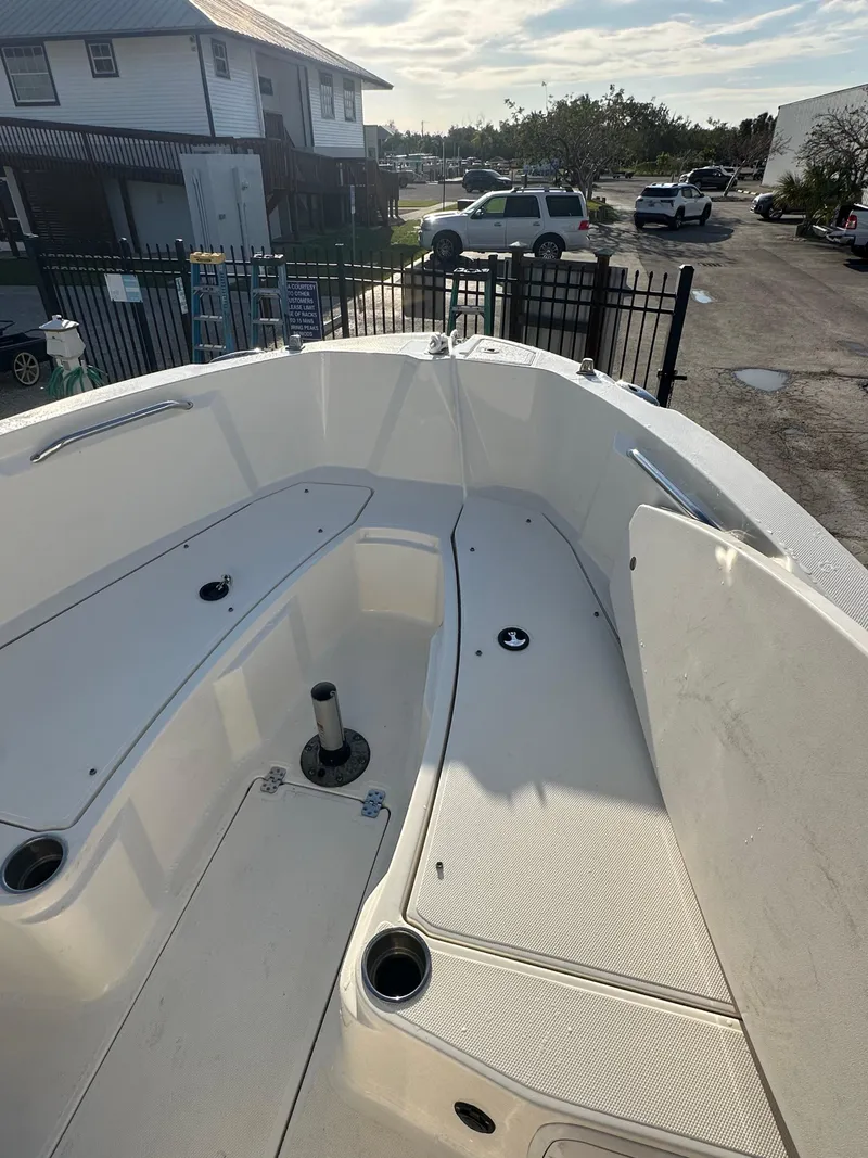 Slide: The Image of 2015 Striper 200 Center Console boat interior with seating and storage compartments. - 7