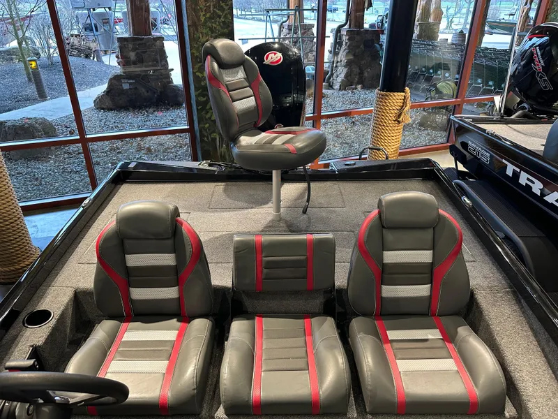 Slide: The Image of 2024 Ranger RT188P boat interior with gray and red seating, showcasing modern design. - 4