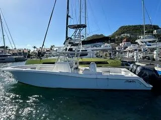 Slide: The Image of 2017 Invincible 39 Open Fisherman boat docked in a marina. - 1