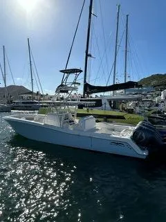 Slide: The Image of 2017 Invincible 39 Open Fisherman boat docked in a sunny marina. - 14
