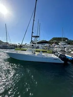 Slide: The Image of 2017 Invincible 39 Open Fisherman boat docked in a sunny marina. - 15
