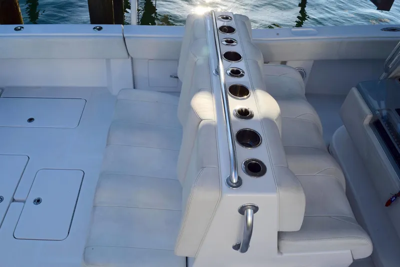 Slide: The Image of 2014 Invincible Open Fisherman boat seating with multiple cup holders. - 5