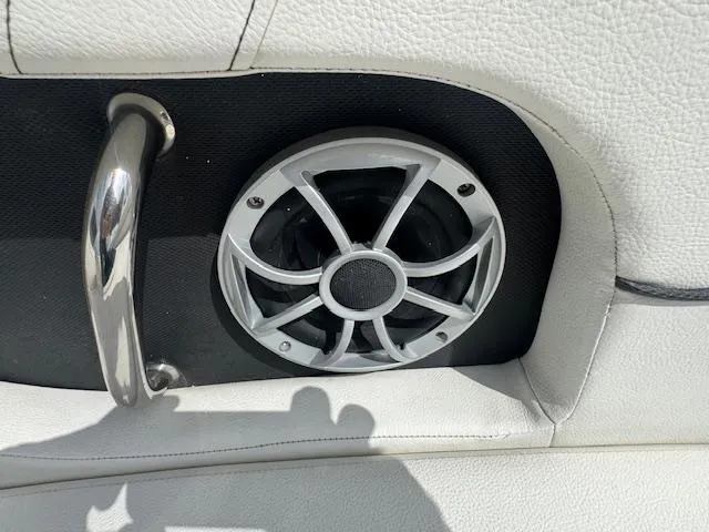 Slide: The Image of Speaker and handle on 2014 Sea Ray 220 SD Outboard boat interior. - 6