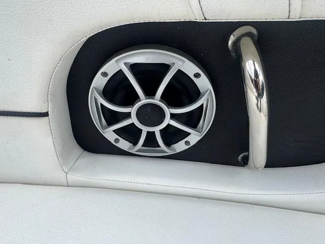 Slide: The Image of Speaker and handle on 2014 Sea Ray 220 SD Outboard boat interior. - 8