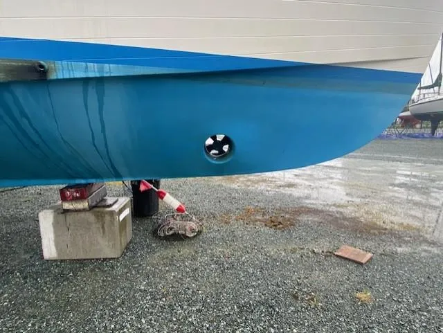 Slide: The Image of Ocean Alexander 50 MK1 yacht hull, 1980 model, on dry dock with visible thruster. - 47