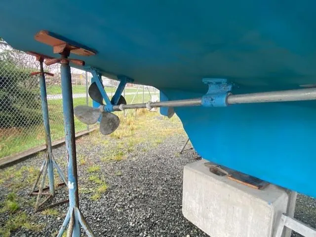 Slide: The Image of Ocean Alexander 50 MK1 (1980) boat propeller and hull on stands. - 48
