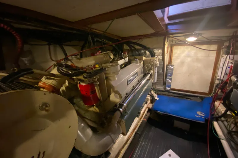 Slide: The Image of Engine room of 1980 Ocean Alexander 50 MK1 yacht with Cummins engine. - 70