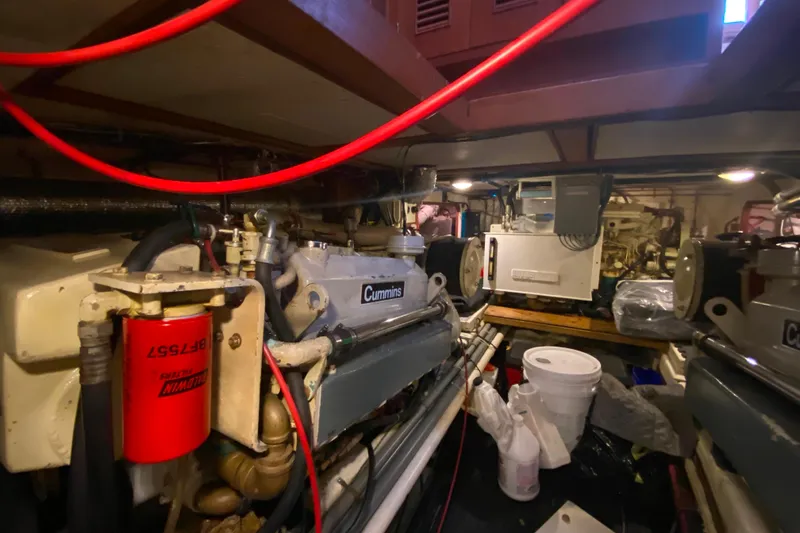 Slide: The Image of Engine room of 1980 Ocean Alexander 50 MK1 with Cummins engine components. - 72