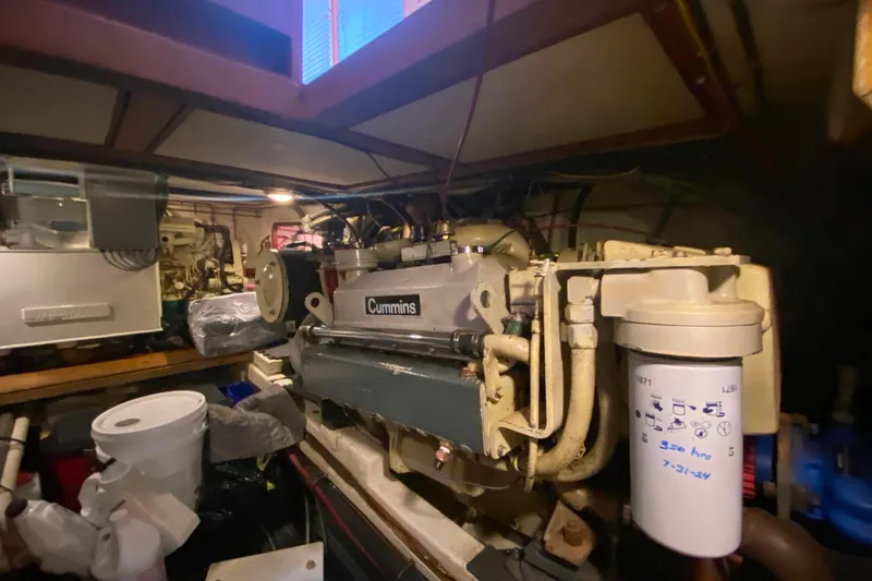 Slide: The Image of Engine room of 1980 Ocean Alexander 50 MK1 with Cummins engine. - 73