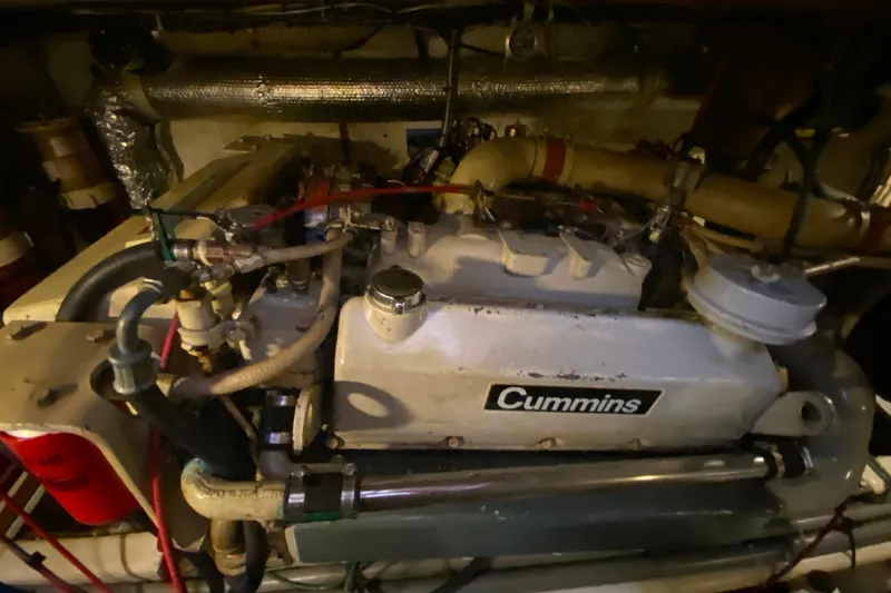 Slide: The Image of Engine room of 1980 Ocean Alexander 50 MK1 with Cummins engine components. - 76