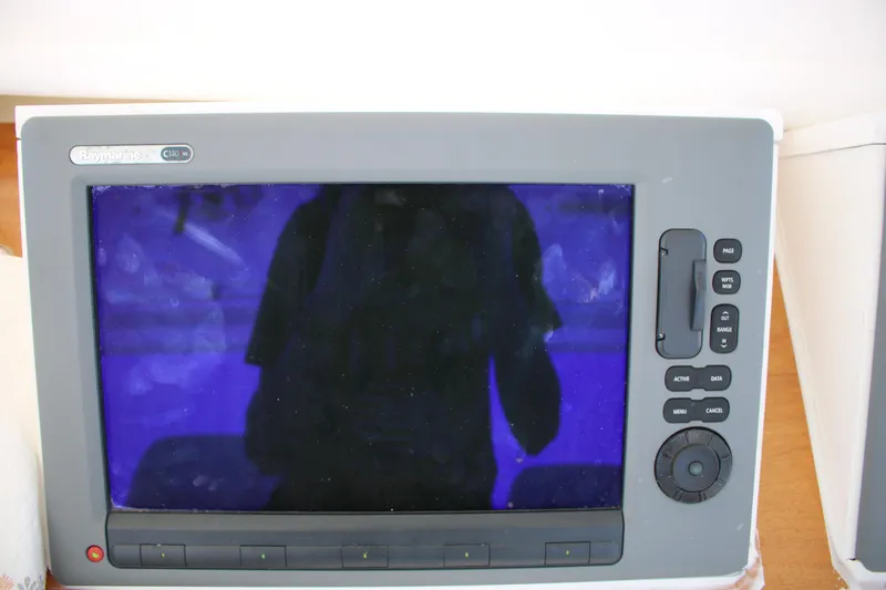 Slide: The Image of Electronic display on a 1999 Ocean Yachts model yacht, featuring control buttons. - 31