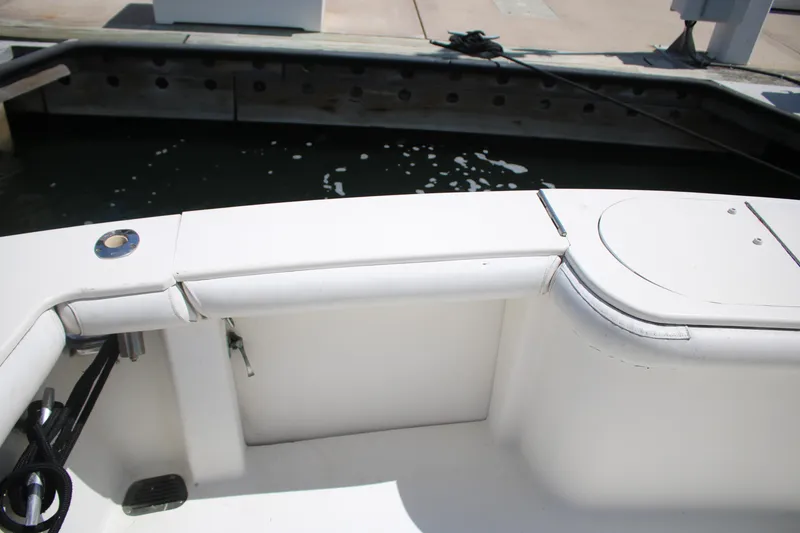 Slide: The Image of 1999 Ocean Yachts model, white deck view at marina. - 20