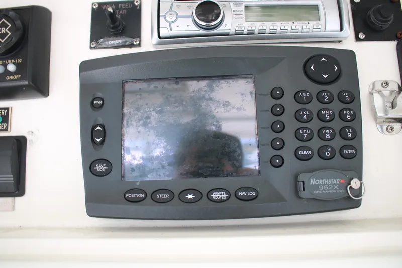 Slide: The Image of Navigation system on a 1999 Ocean Yachts model yacht dashboard. - 37