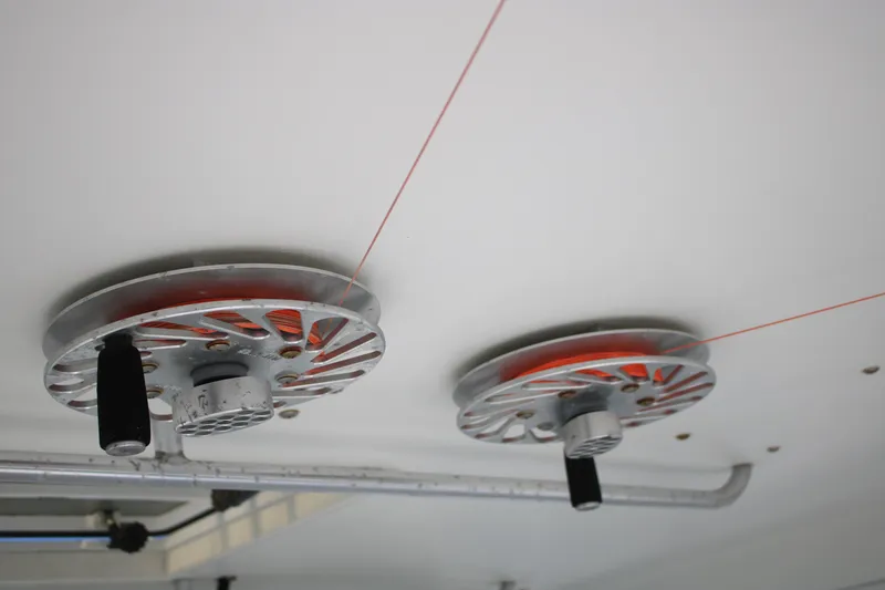 Slide: The Image of Ceiling-mounted pulleys on a 1999 Ocean Yachts model, showcasing mechanical components. - 39