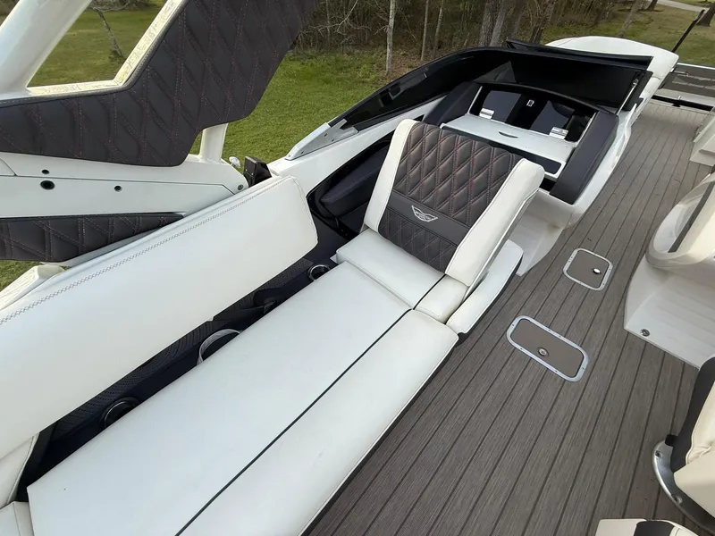 Slide: The Image of 2019 Bennington 25 QX Sport boat interior with luxurious seating and modern design. - 14
