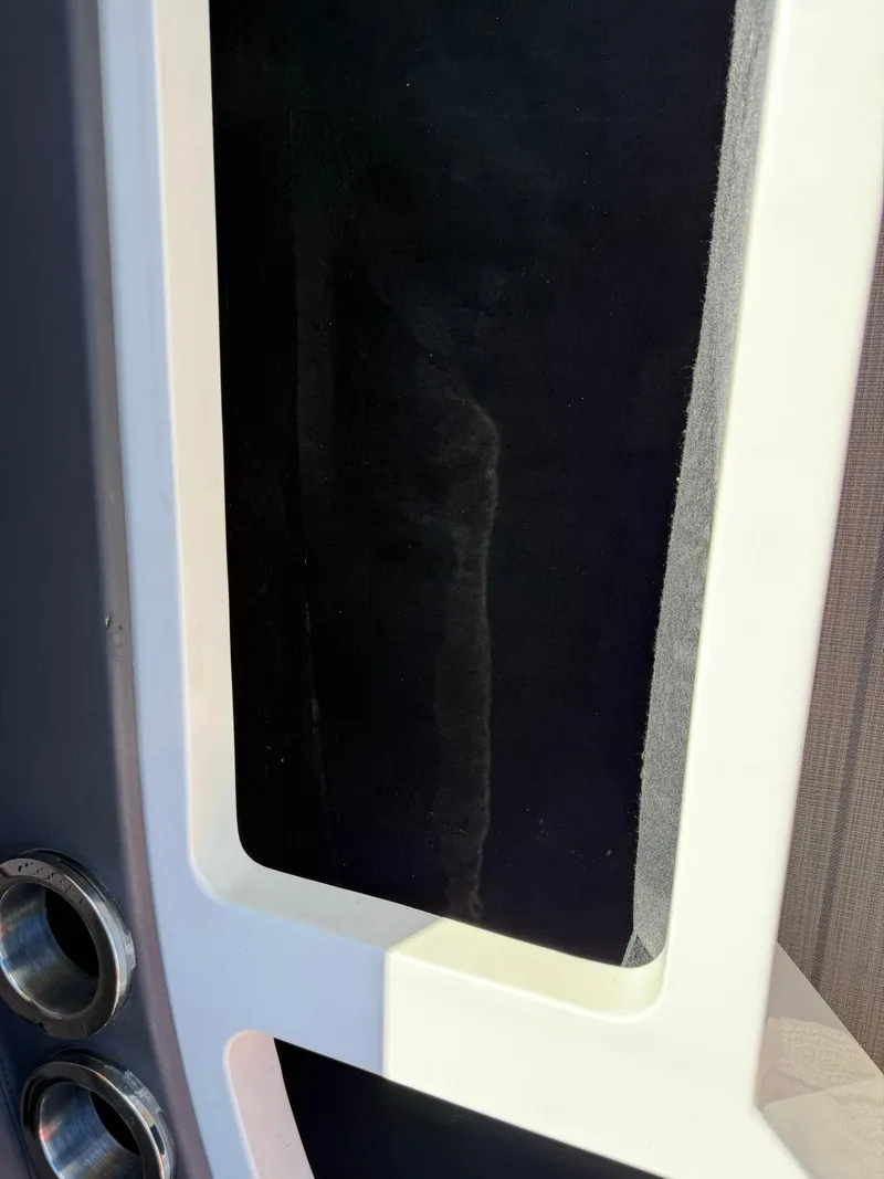 Slide: The Image of Close-up of 2019 Bennington 25 QX Sport boat interior detail with sleek design elements. - 37