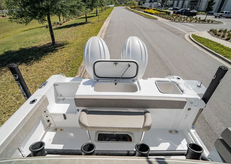 Slide: The Image of 2025 Sea Hunt Gamefish 25 boat interior with seating and storage compartments. - 7