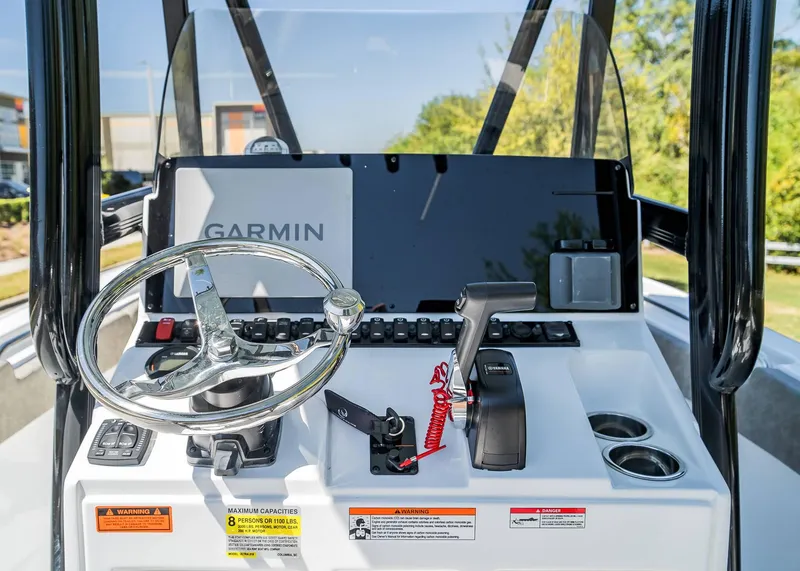 Slide: The Image of Helm of 2025 Sea Hunt Ultra 219 boat with Garmin navigation system. - 20