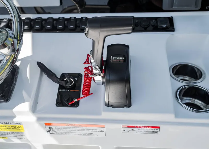 Slide: The Image of Control panel of 2025 Sea Hunt Ultra 219 boat with Yamaha throttle. - 21