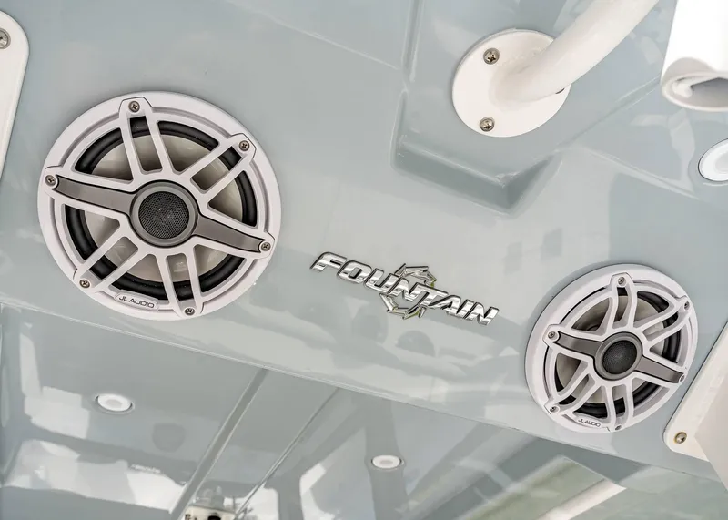 Slide: The Image of 2026 Fountain 38 TE boat with JL Audio speakers and logo detail. - 25