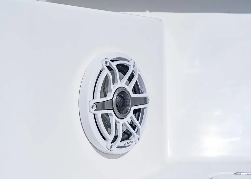 Slide: The Image of White speaker on 2026 Fountain 38 TE boat, mounted on a sleek white surface. - 7