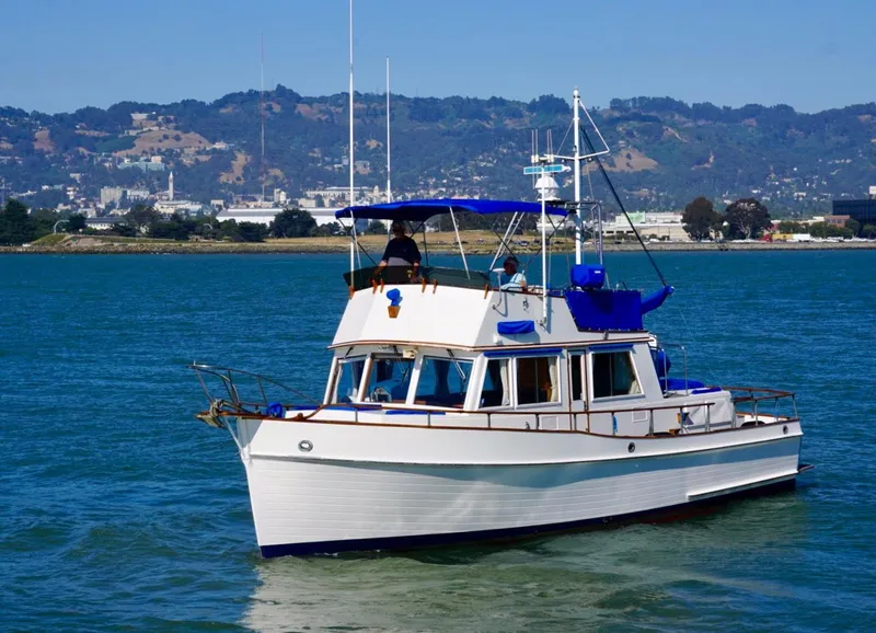 Slide: The Image of 1982 Grand Banks Classic yacht cruising near Golden Gate Bridge, San Francisco. - 2