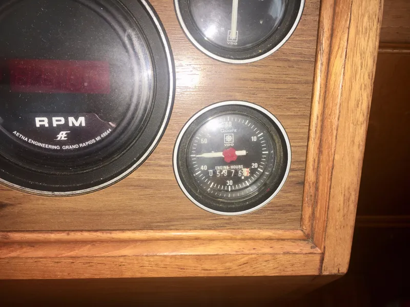 Slide: The Image of Simrad navigation system on 1982 Grand Banks Classic boat dashboard. - 21