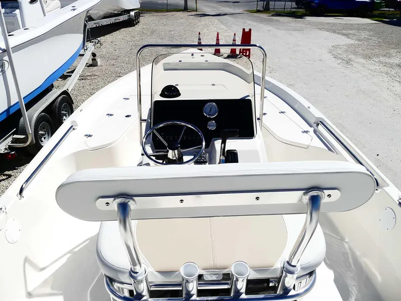 Slide: The Image of 2025 Bulls Bay 2200 boat interior with steering wheel and control panel. - 10