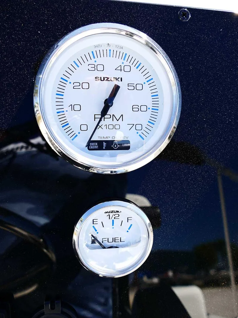Slide: The Image of Tachometer and fuel gauge on 2025 Bulls Bay 2200 boat dashboard. - 16