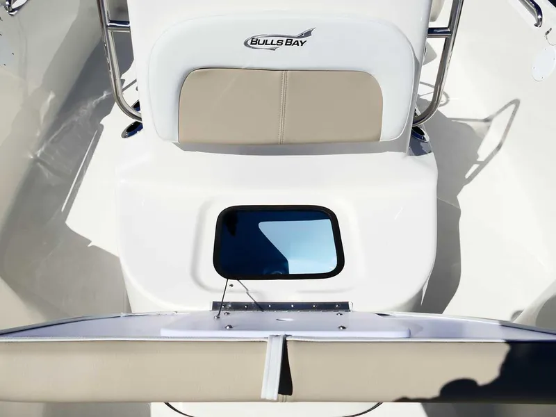Slide: The Image of 2025 Bulls Bay 2200 boat interior with seating and storage compartment. - 30
