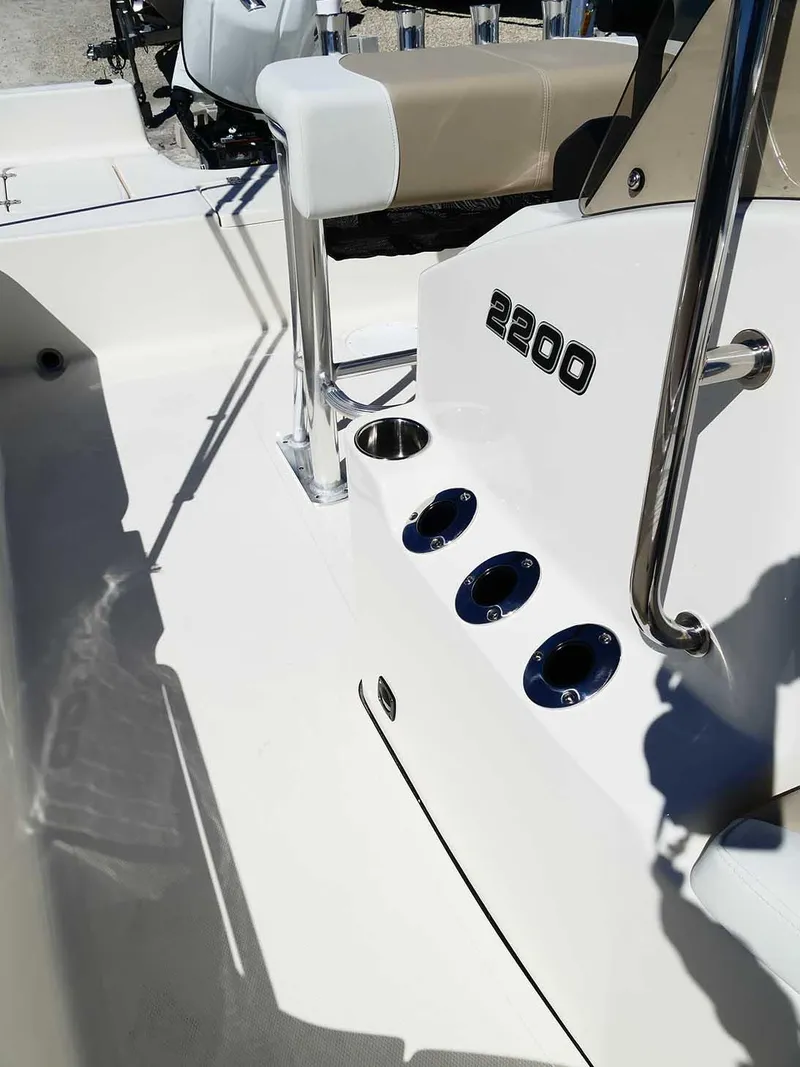 Slide: The Image of 2025 Bulls Bay 2200 boat interior with seating and rod holders. - 31