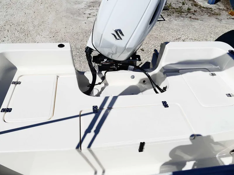 Slide: The Image of 2025 Bulls Bay 2200 boat with Suzuki outboard motor, featuring spacious deck and storage compartments. - 35