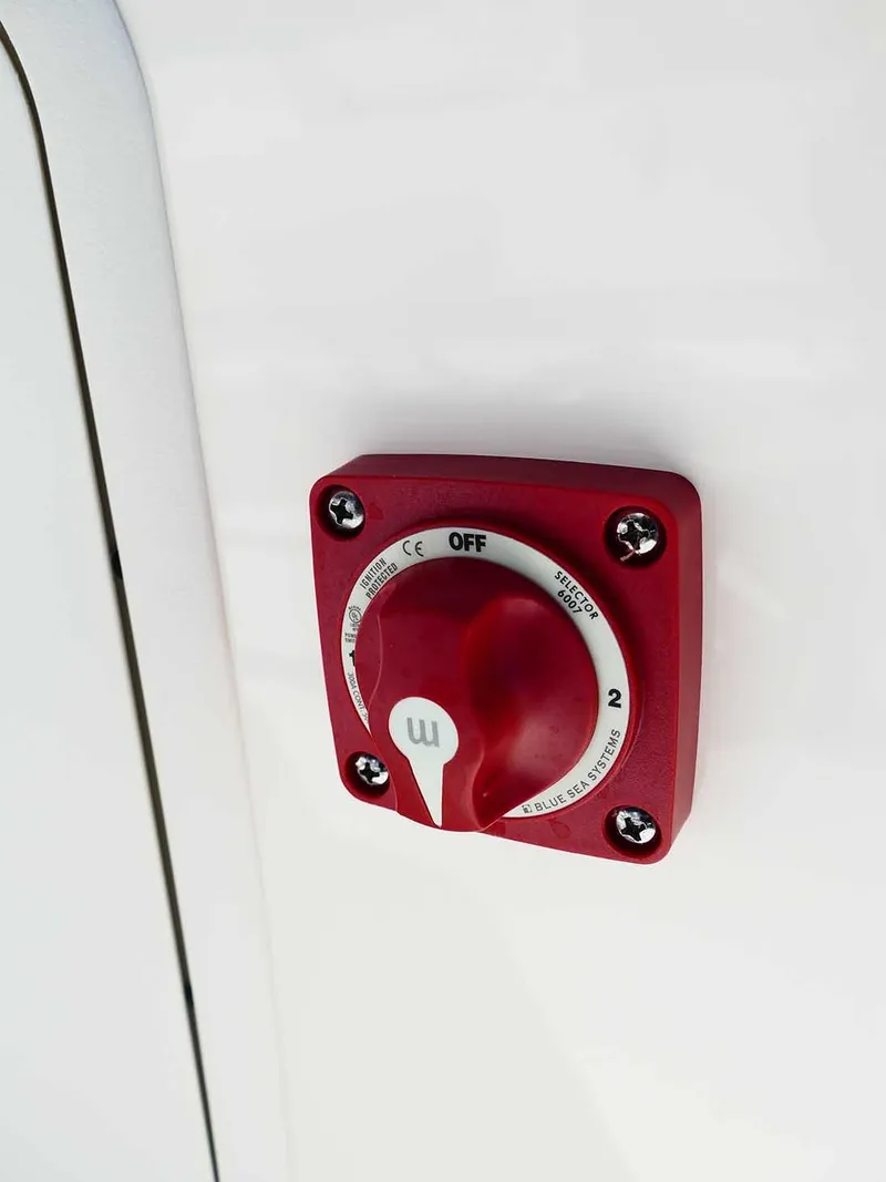 Slide: The Image of Red switch on Bulls Bay 2200 boat, 2025 model, mounted on white surface. - 39