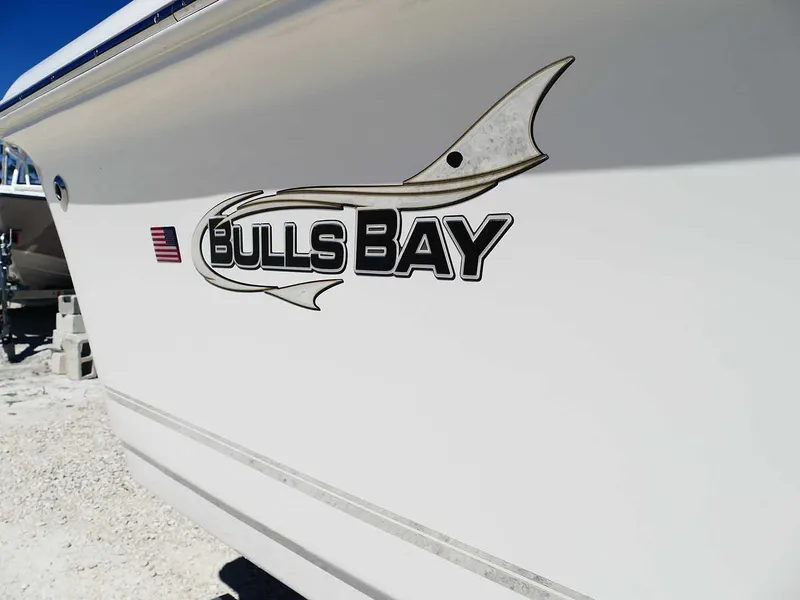 Slide: The Image of Bulls Bay 2200 boat logo on white hull, 2025 model. - 6