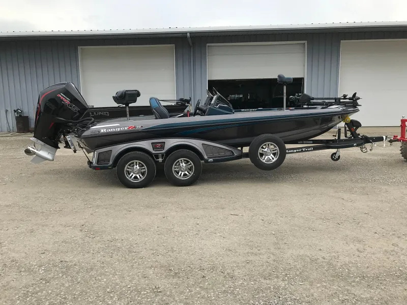 Slide: The Image of 2025 Ranger Z519 Garmin Cup-Equipped boat, Mercury promotion, 'Get 7 Years' offer, QR code included. - 1