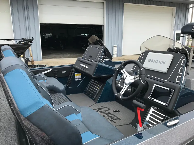 Slide: The Image of 2025 Ranger Z519 Garmin Ranger Cup Equipped boat interior with steering wheel and navigation system. - 14