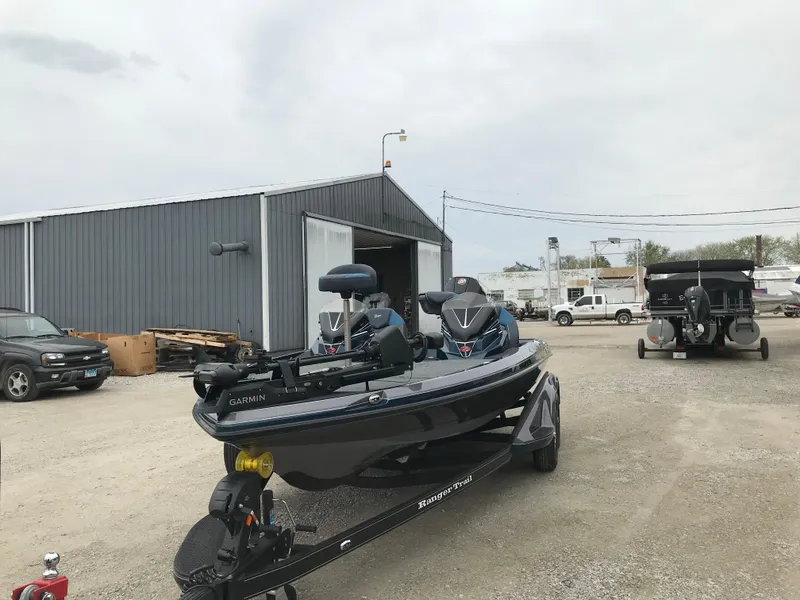 Slide: The Image of 2025 Ranger Z519 Garmin Ranger Cup Equipped boat on trailer in outdoor setting. - 5