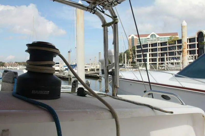 Slide: The Image of Sailboat deck view of 1995 Voyage Yachts Mayotte in marina setting. - 14