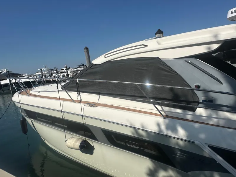 Slide: The Image of 2018 Bavaria S40 Coupe yacht docked at marina under clear blue sky. - 15