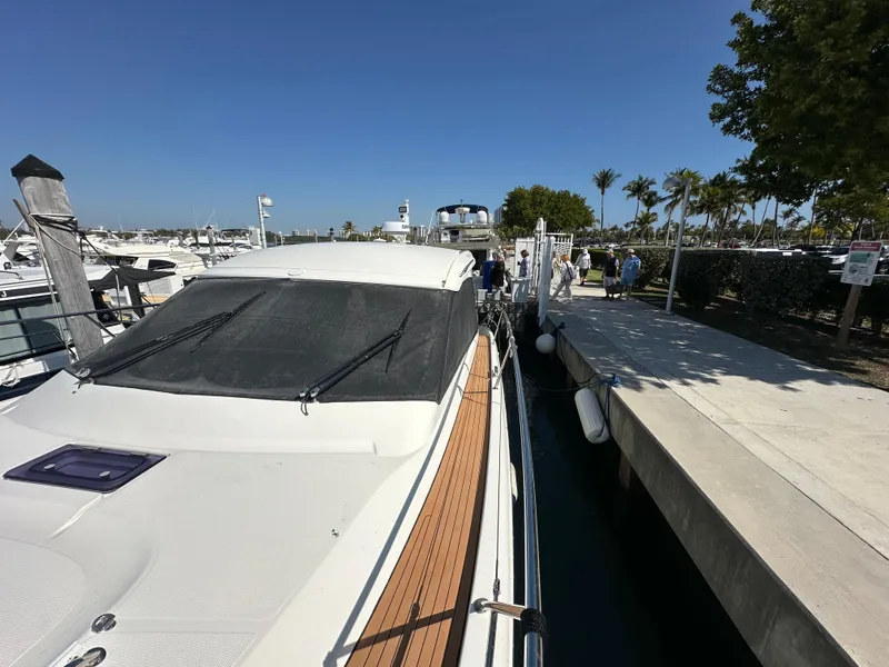 Slide: The Image of 2018 Bavaria S40 Coupe docked at marina under clear blue sky. - 20