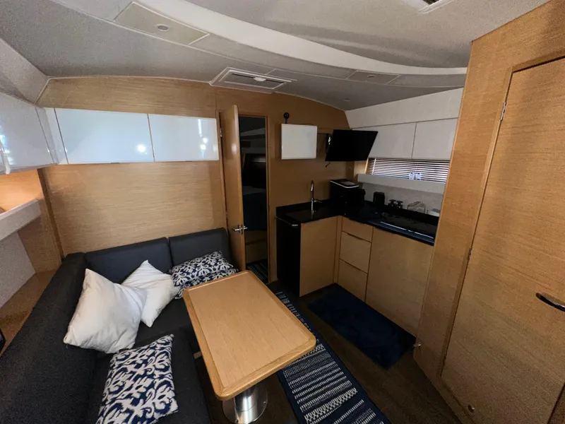 Slide: The Image of Interior of 2018 Bavaria S40 Coupe yacht with modern kitchen and cozy seating area. - 37
