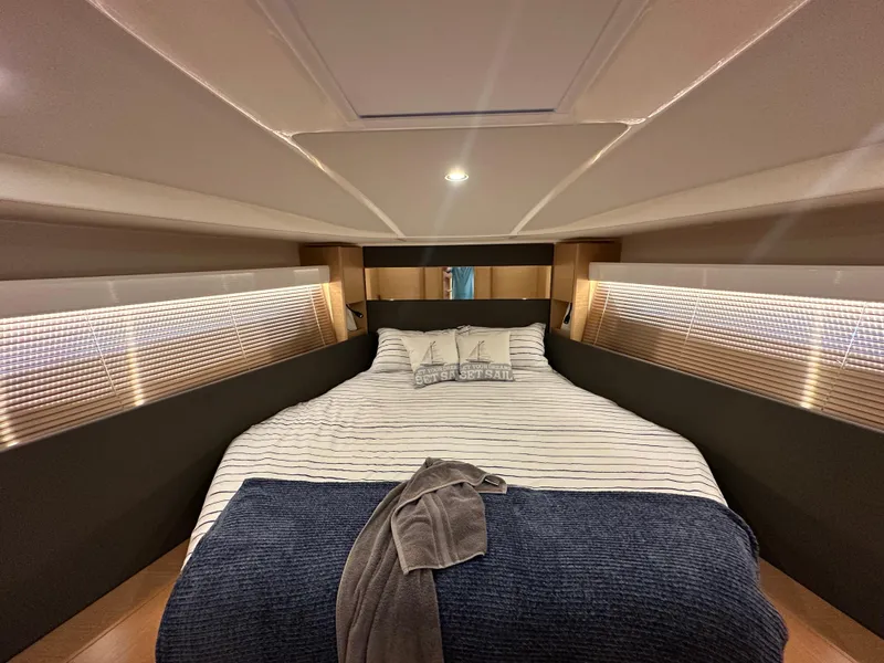 Slide: The Image of Luxurious interior cabin of 2018 Bavaria S40 Coupe with cozy bed and ambient lighting. - 41