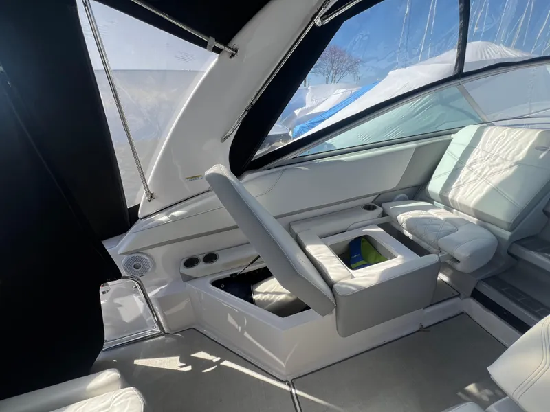 Slide: The Image of Interior of 2020 Regal 26 XO boat with seating and storage compartments. - 15