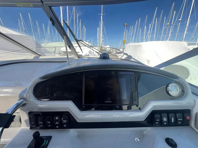Slide: The Image of Control panel of a 2020 Regal 26 XO boat with navigation display. - 24