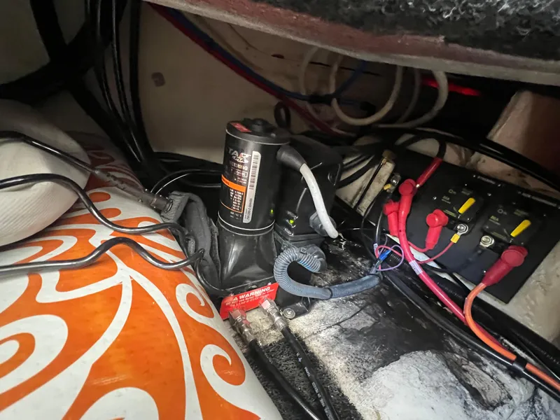 Slide: The Image of Electrical wiring and components inside a 2020 Regal 26 XO boat. - 44