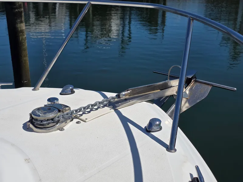 Slide: The Image of Bow of 2004 Wellcraft 252 Coastal boat with anchor and chain. - 10